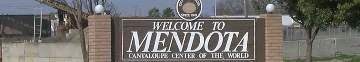 a picture of the sign welcoming you to Mendota, the cantaloupe capital of the world