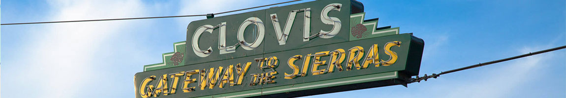 a picture of the gateway to the sierras sign which is a landmark in clovis